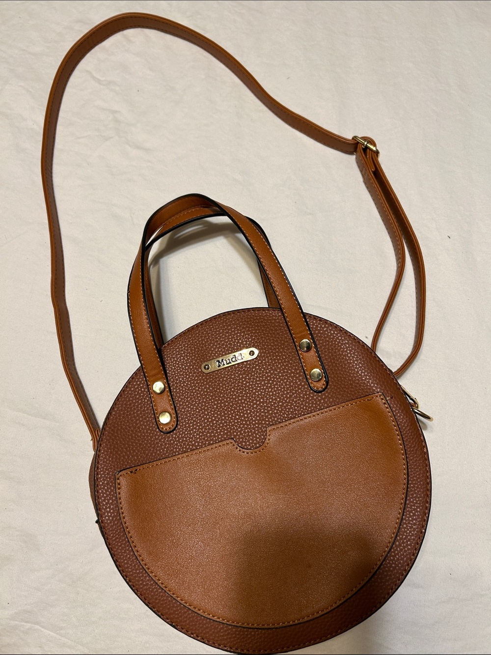 Mudd Round Crossbody Bag in Brown and Tan